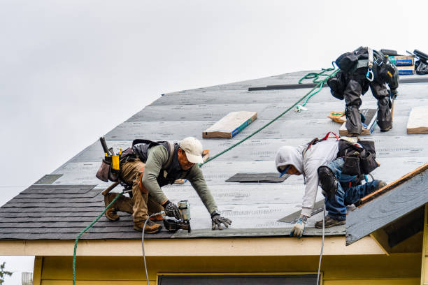 Professional Gutter Installation technician working in Warsaw, MO